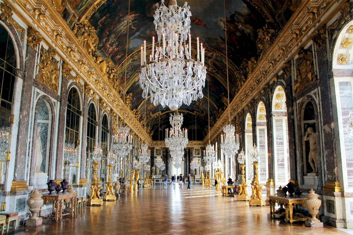 The Hall of Mirrors at the Palace of Versailles, the grandest day trip from the museums in Paris