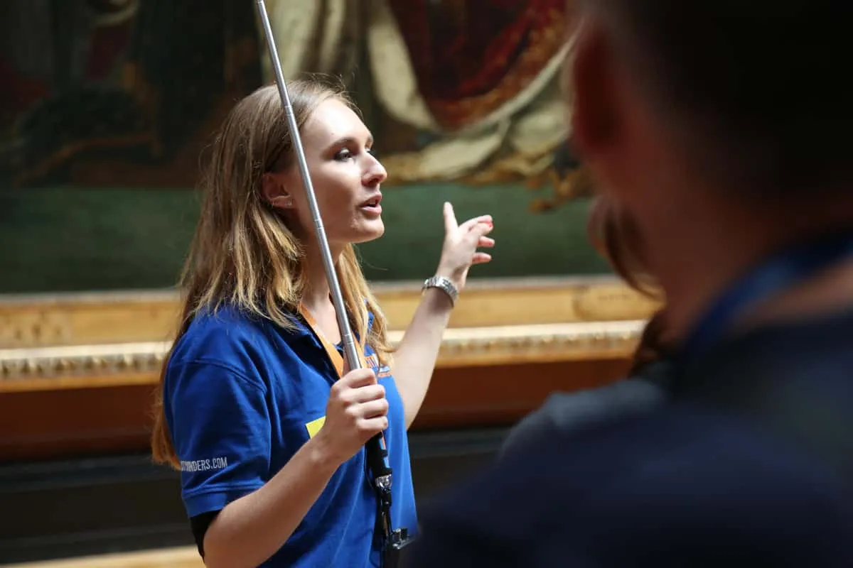Grande Galerie of the Louvre lined with paintings, one of the essential museums in Paris