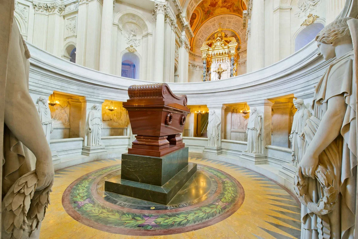 Napoleon's red porphyry tomb beneath the golden dome of Les Invalides, a monumental museum in Paris