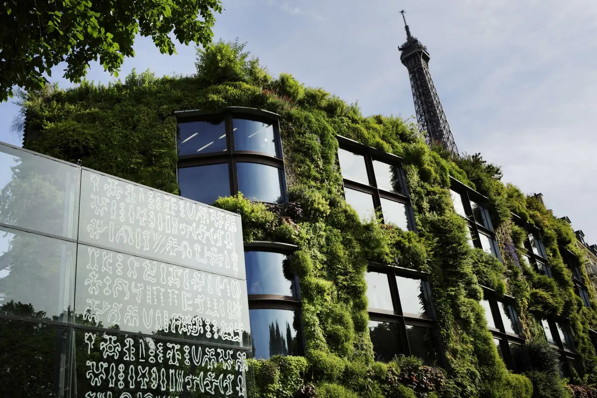 The living green wall of the Musée du Quai Branly below the Eiffel Tower, a modern museum in Paris